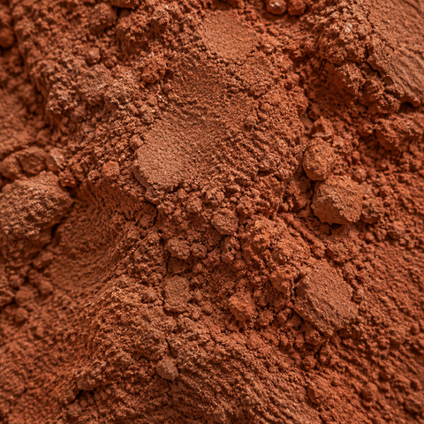 Close-up of red rhassoul clay
