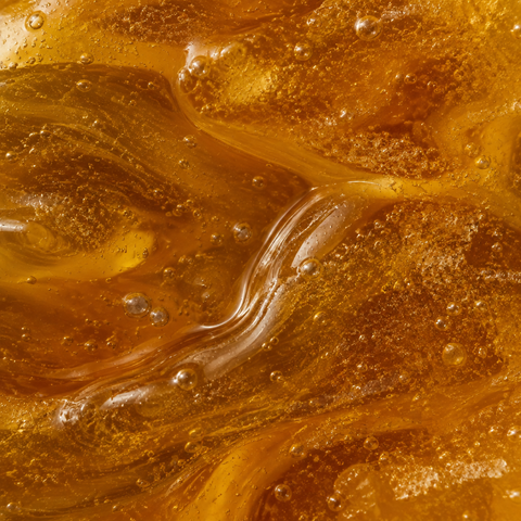 Extreme close-up of raw honey texture